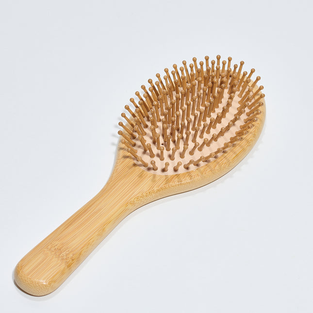 Spazzola per capelli ovale in legno