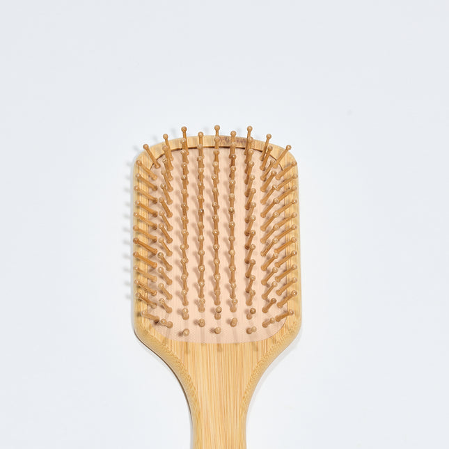 Spazzola per capelli in legno